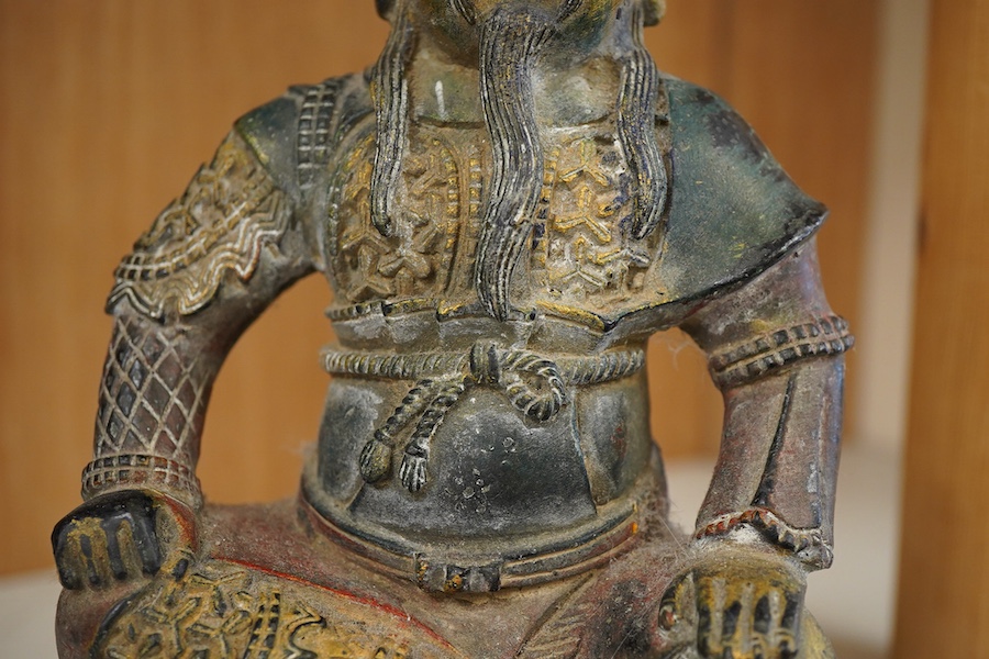 A gilt bronze figure of a Japanese warrior 22cm high.